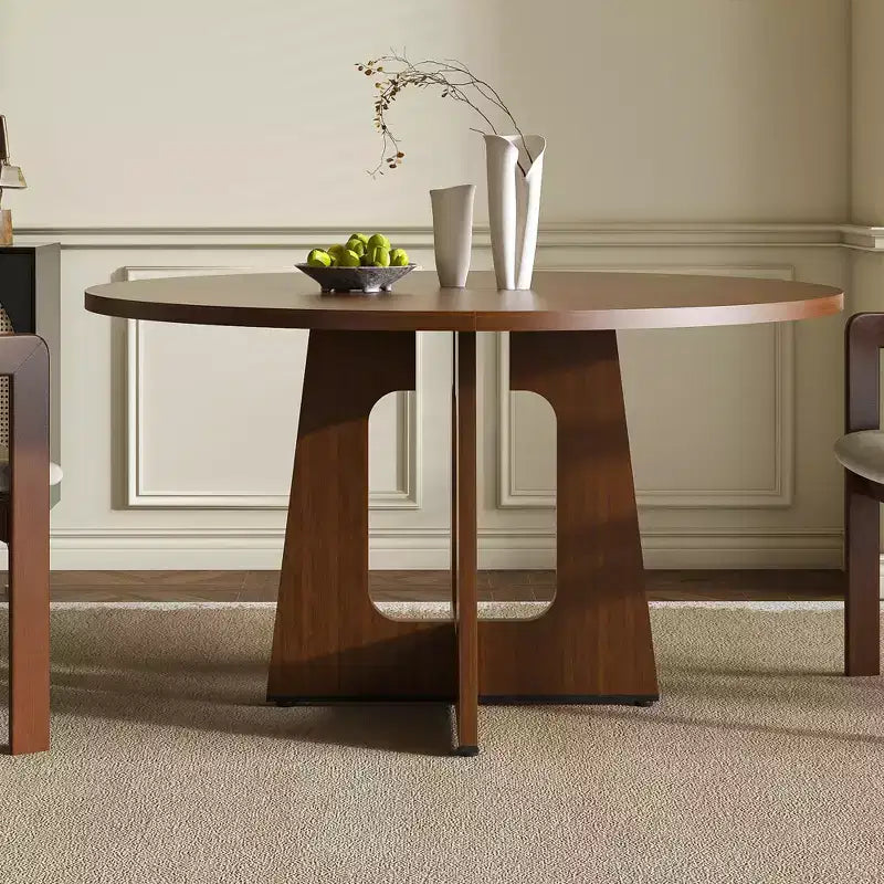 Table à manger ronde marron, peut accueillir jusqu'à 6 personnes